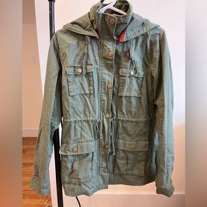 Light weight olive jacket with a hood. Army style.